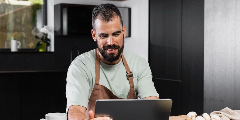 Food influencer filming Reels for restaurant social media marketing using trending sounds on Instagram.